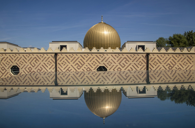 Cambridge mosque - Brick tile cladding crenulations dome reflected in rooflight